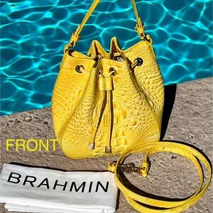 A pocketbook full of sunshine.  
Brahmin Melinda Bucket Bag in Buttercup